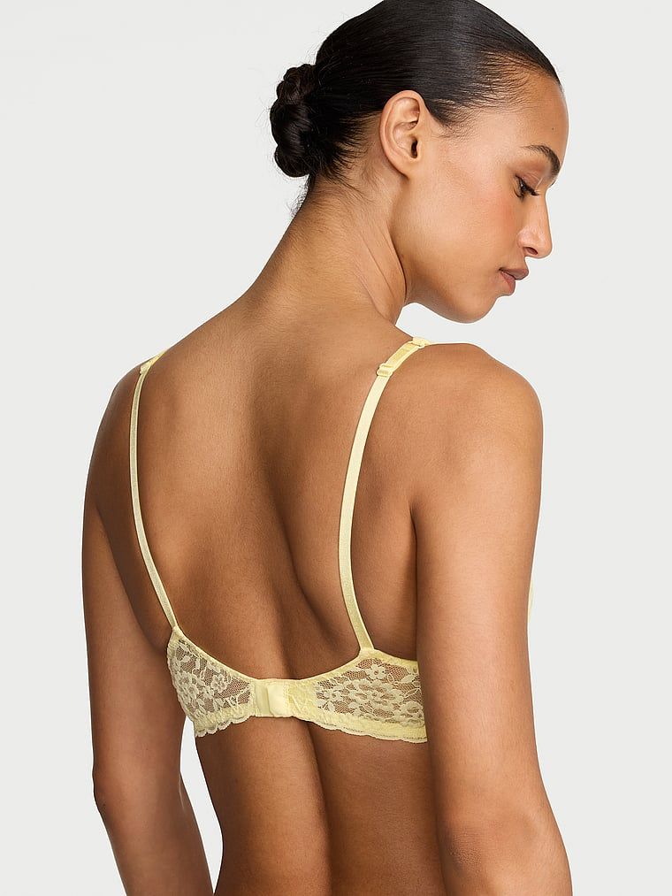 Biustonosz nieusztywniany balkonetka koronkowy. Produkt ma kolor żółty i pochodzi z kolekcji Victoria's Secret. 