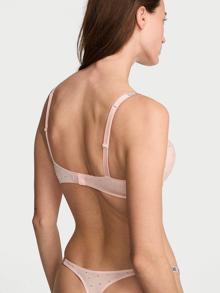 Biustonosz push-up powiększający o 2 rozmiary Bombshell Shine Strap Dot. Produkt ma kolor różowy i pochodzi z kolekcji Very Sexy. 
