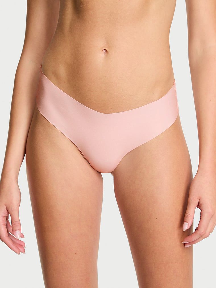 Stringi bezszwowe z siateczką z tyłu No-Show Sheer Logo. Produkt ma kolor różowy i pochodzi z kolekcji Body by Victoria. 