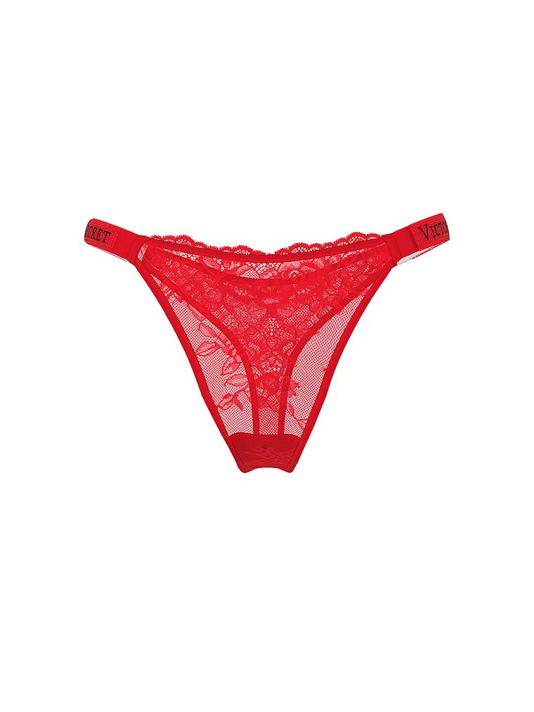 Stringi koronkowe z błyszczącymi paskami Shine Strap. Produkt ma kolor czerwony i pochodzi z kolekcji Very Sexy. 