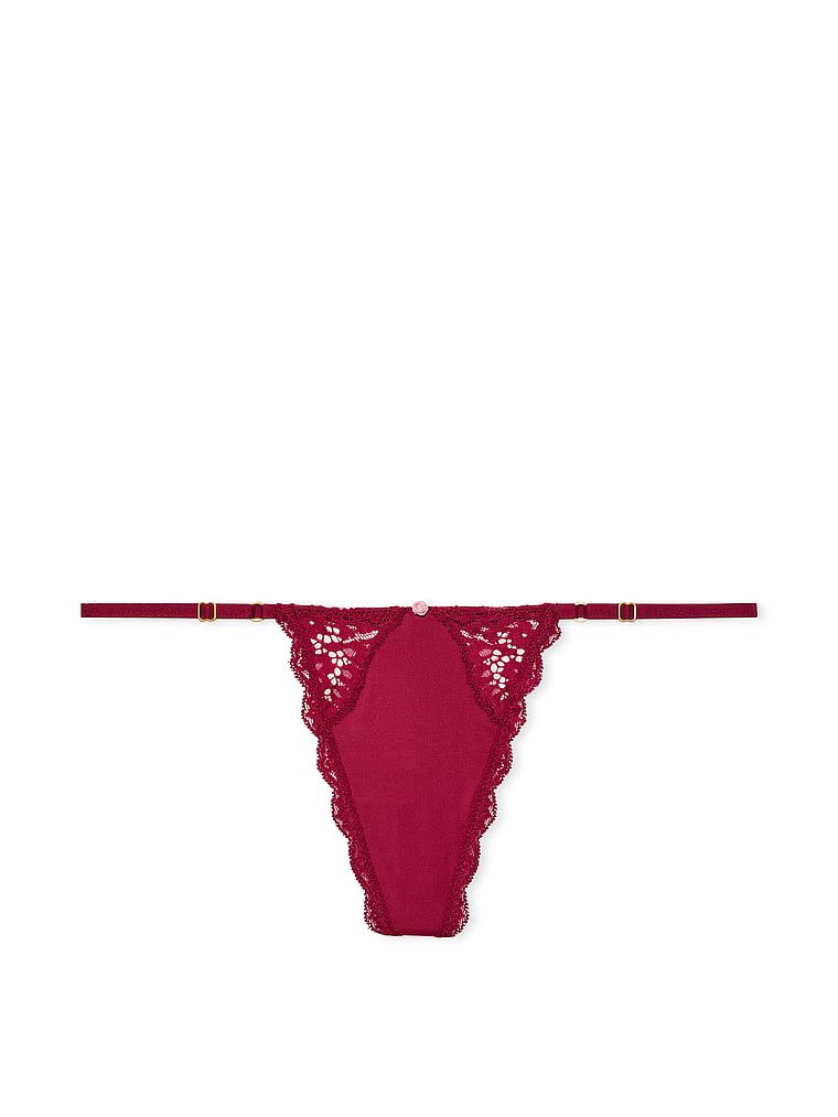 Stringi z koronką z regulowanymi paskami Lace-Trim V-String. Produkt ma kolor czerwony i pochodzi z kolekcji Dream Angels. 
