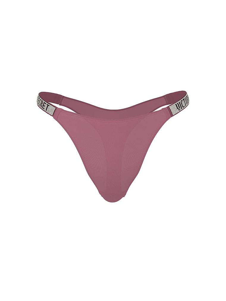 Majtki brazyliany z błyszczącymi paskami Shine Strap Brazilian. Produkt ma kolor purpurowy i pochodzi z kolekcji Very Sexy. 
