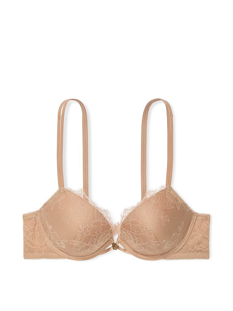 Na zdjęciu na białym tle widoczny jest biustonosz push-up koronkowy Rose Lace. Produkt ma kolor beżowy i pochodzi z kolekcji Very Sexy.