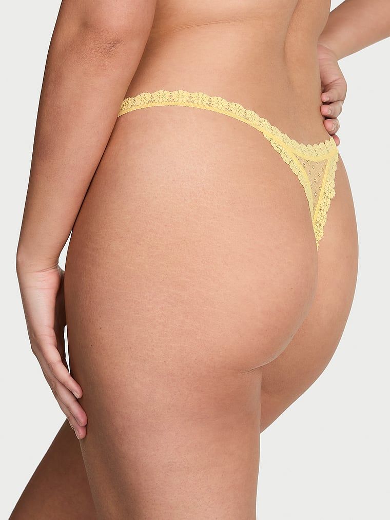 Stringi koronkowe Daisy. Produkt ma kolor żółty i pochodzi z kolekcji Lacie. 