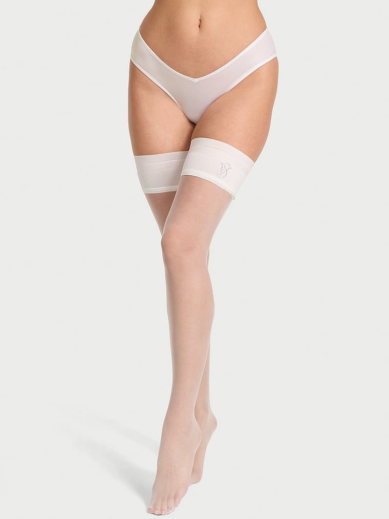 Pończochy z koronką i logo marki (do pasa do pończoch). Produkt ma kolor biały i pochodzi z kolekcji Very Sexy. 