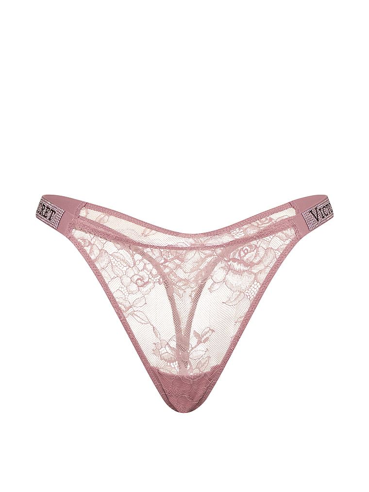 Stringi koronkowe z błyszczącymi paskami Shine Strap. Produkt ma kolor różowy i pochodzi z kolekcji Very Sexy. 