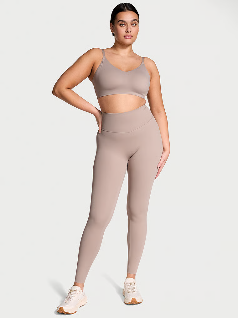 Legginsy z niską kompresją VS Elevate. Produkt ma kolor beżowy i pochodzi z kolekcji VSX. 