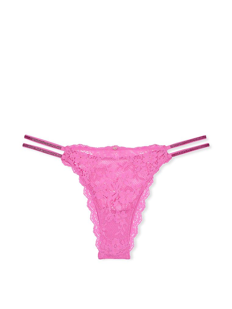 Majtki brazyliany koronkowe z błyszczącymi paseczkami Twinkle Strap Brazilian. Produkt ma kolor różowy i pochodzi z kolekcji Dream Angels. 