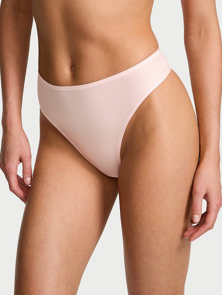 Stringi z wysokim stanem i paseczkami z tyłu Strappy-Back. Produkt ma kolor różowy i pochodzi z kolekcji Very Sexy. 