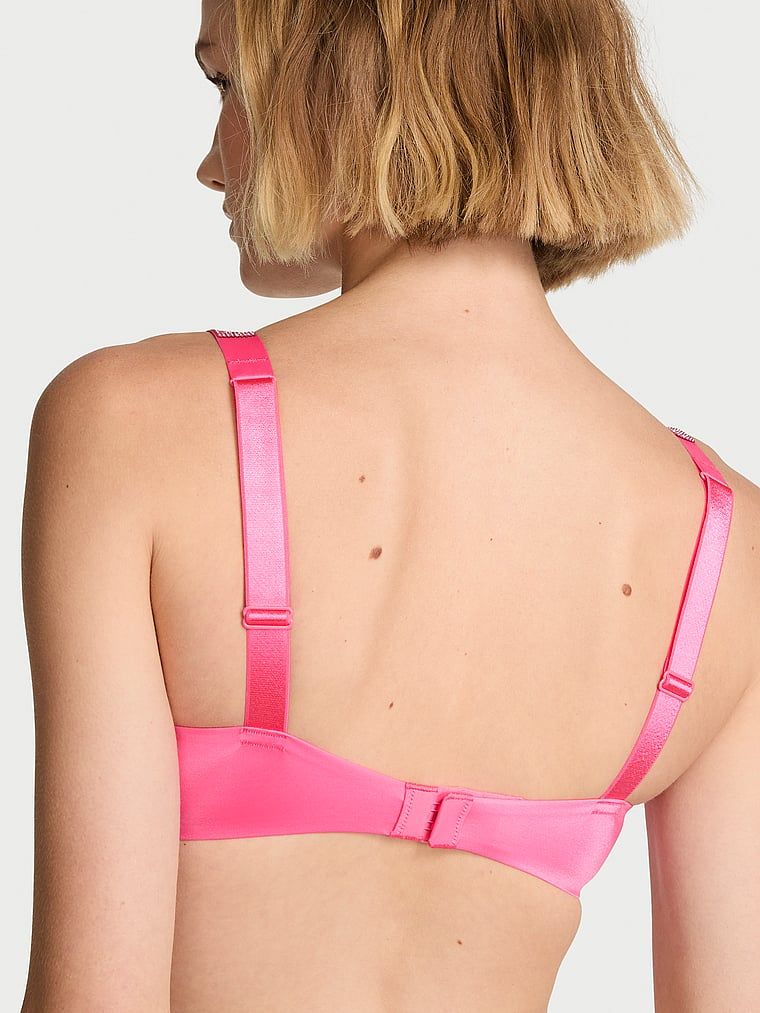 Biustonosz push-up powiększający o 2 rozmiary Bombshell Shine Strap. Produkt ma kolor różowy i pochodzi z kolekcji Very Sexy. 