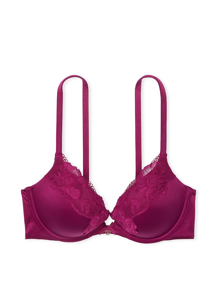 Na zdjęciu na białym tle widoczny jest biustonosz push-up z koronką Lace-Trim. Produkt ma kolor czerwony i pochodzi z kolekcji Body by Victoria.