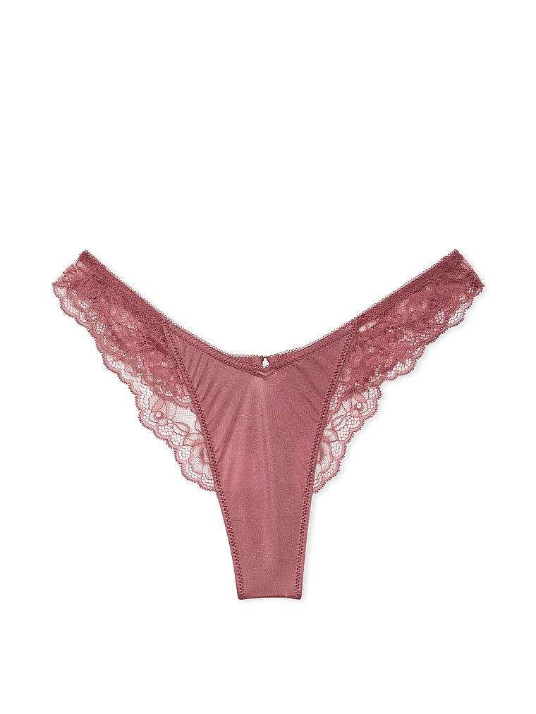 Stringi z koronką i wysoko wyciętymi nogawkami Lace-Trim High-Leg. Produkt ma kolor różowy i pochodzi z kolekcji Very Sexy. 