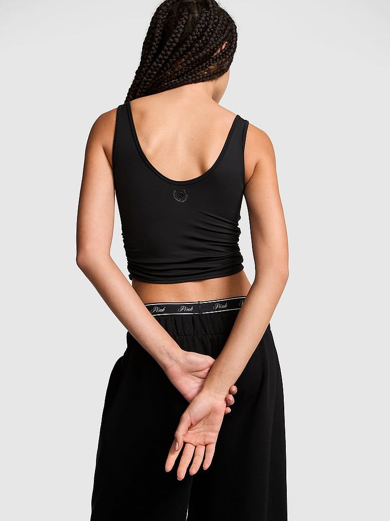 Kopertowy top biustonoszowy PINK Relay z marszczeniem