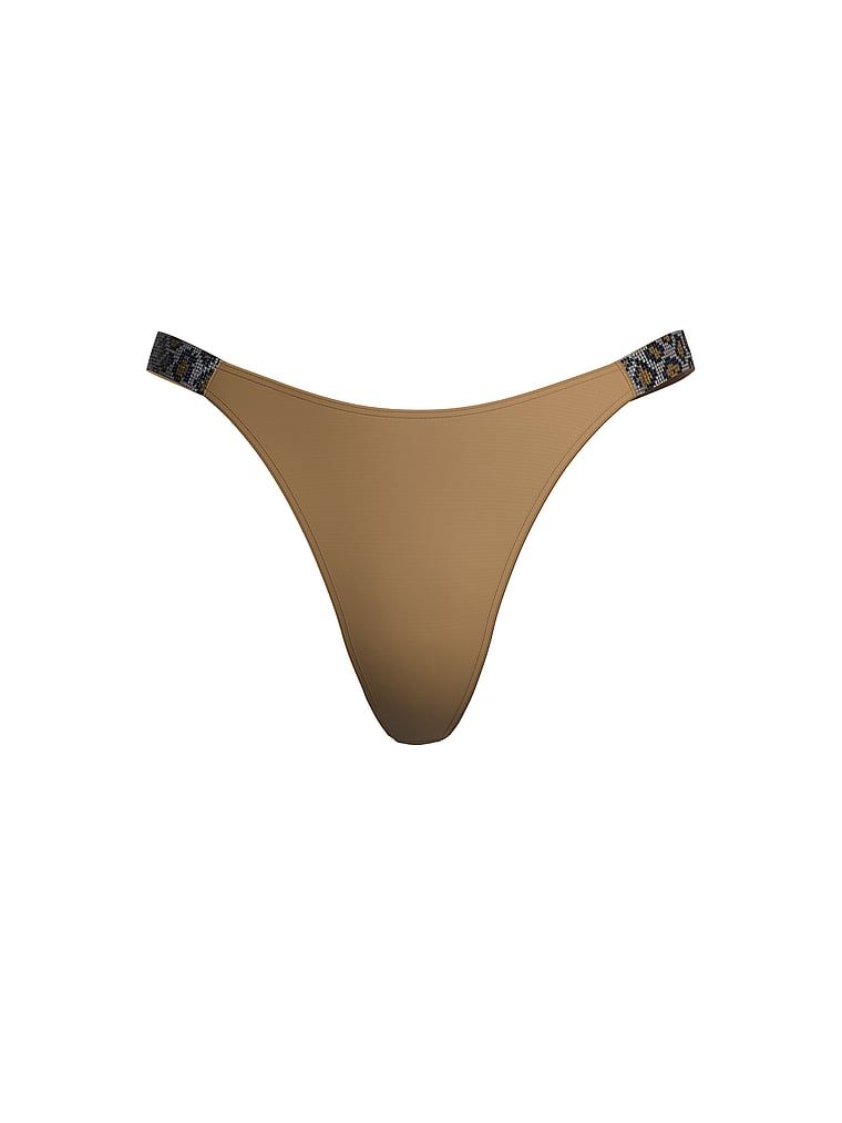 Stringi z błyszczącymi paskami Shine Strap. Produkt ma kolor brązowy i pochodzi z kolekcji Very Sexy. 