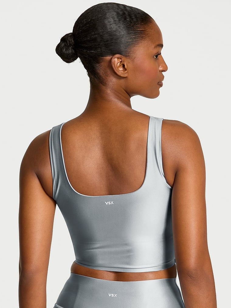Top sportowy z błyszczącego materiału VSX GlossyTech. Produkt ma kolor szary i pochodzi z kolekcji VSX. 
