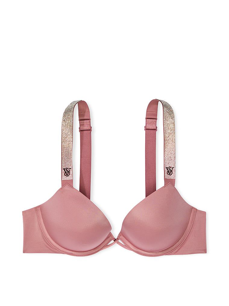 Na zdjęciu na białym tle widoczny jest biustonosz push-up Shine Strap. Produkt ma kolor różowy i pochodzi z kolekcji Very Sexy.