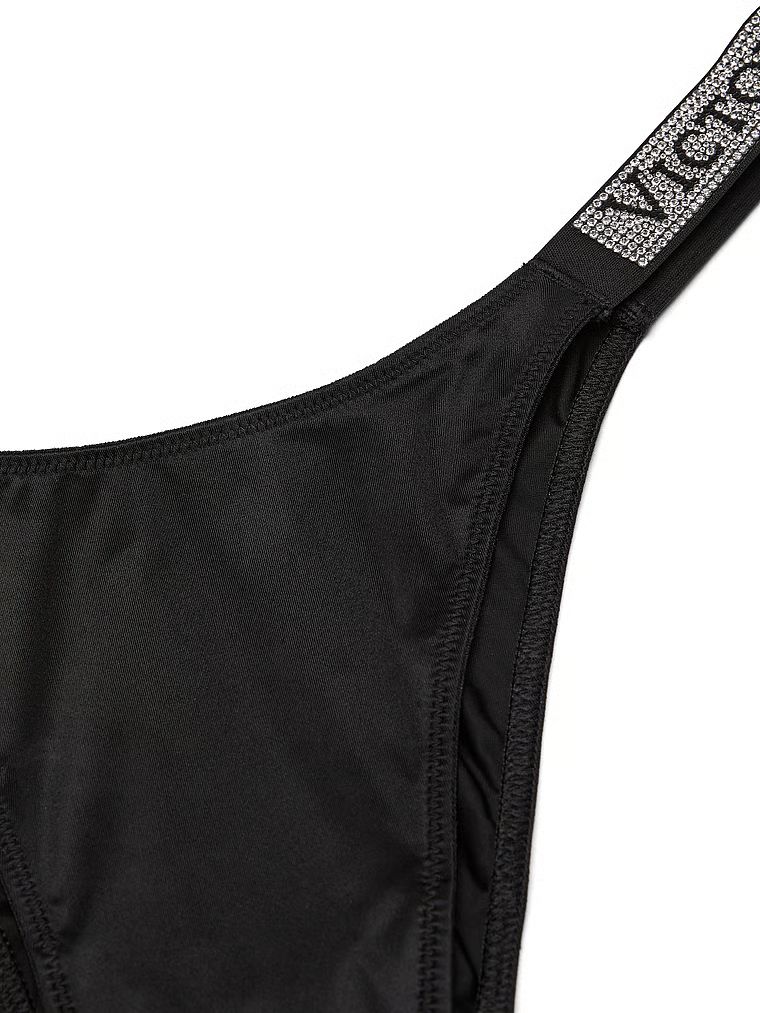 Majtki brazyliany z błyszczącymi paskami Shine Strap Brazilian. Produkt ma kolor czarny i pochodzi z kolekcji Very Sexy. 
