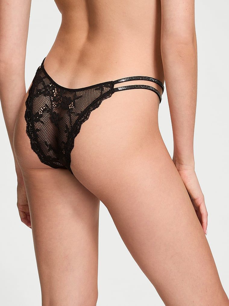 Majtki brazyliany koronkowe z błyszczącymi paseczkami Twinkle Strap Brazilian. Produkt ma kolor czarny i pochodzi z kolekcji Dream Angels. 
