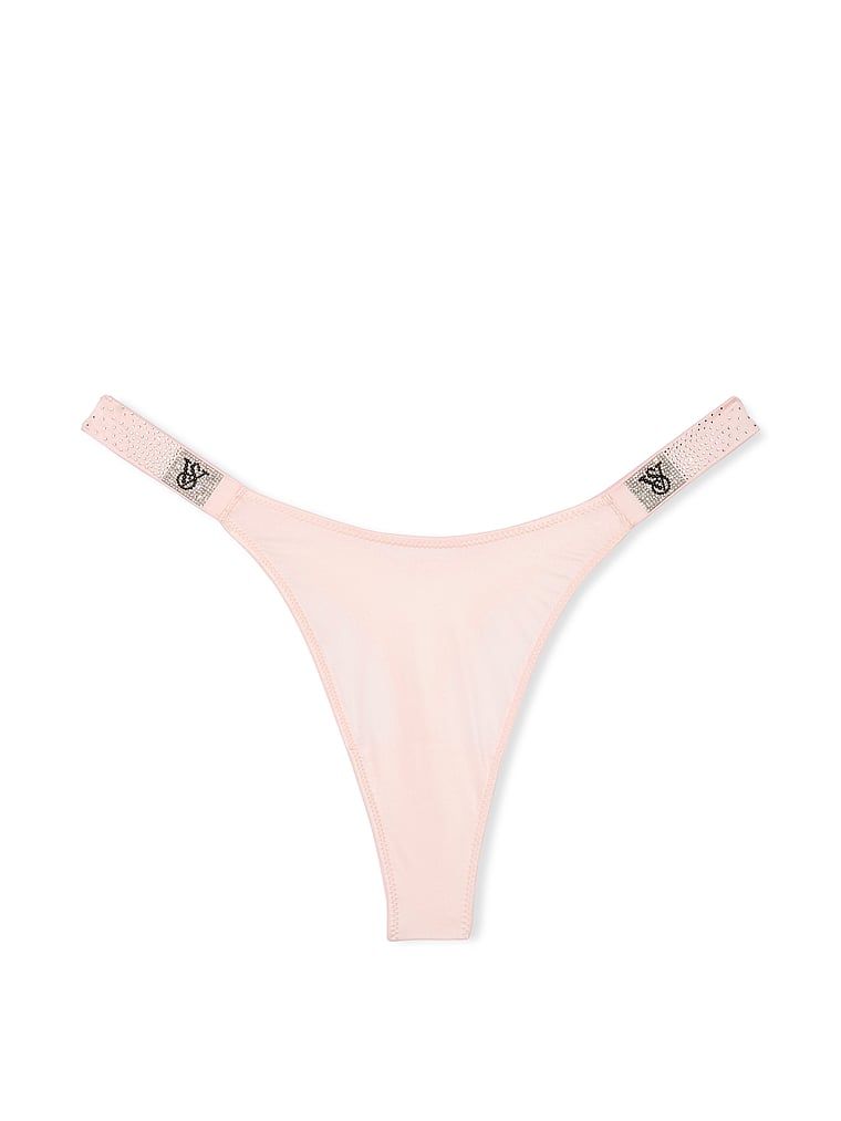 Stringi z błyszczącymi paseczkami Scattered Shine Strap. Produkt ma kolor różowy i pochodzi z kolekcji Very Sexy. 