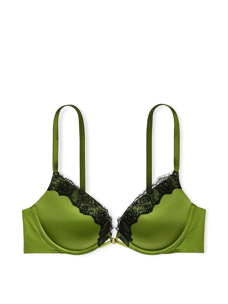 Na zdjęciu na białym tle widoczny jest biustonosz push-up powiększający o 2 rozmiary ze wstawkami z koronki Bombshell Lace-Trim. Produkt ma kolor zielony i pochodzi z kolekcji Very Sexy.