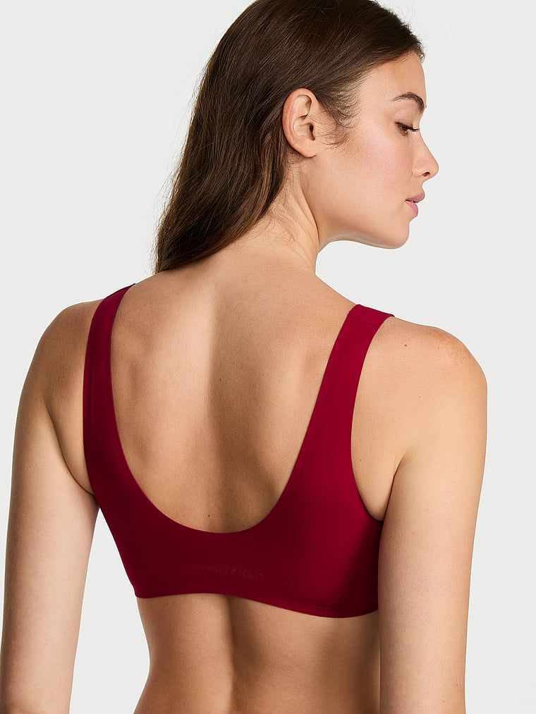 Biustonosz na co dzień i do spania SlumberBra. Produkt ma kolor czerwony i pochodzi z kolekcji Body by Victoria. 