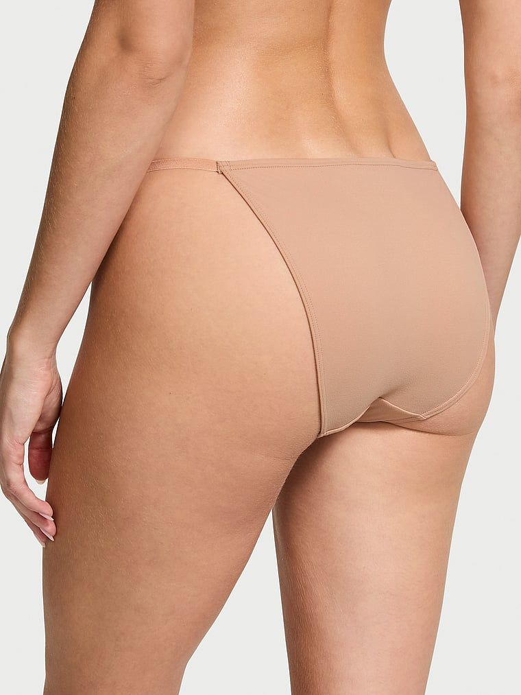 Majtki z regulowanymi paskami Bikini. Produkt ma kolor beżowy i pochodzi z kolekcji Dream Angels. 
