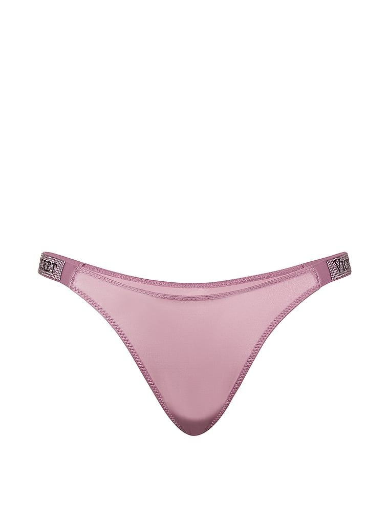 Stringi z błyszczącymi paskami Shine Strap. Produkt ma kolor różowy i pochodzi z kolekcji Very Sexy. 