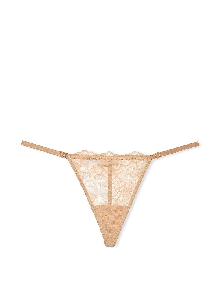 Stringi koronkowe z regulowanymi paskami Rose Lace V-String. Produkt ma kolor beżowy i pochodzi z kolekcji Very Sexy. 