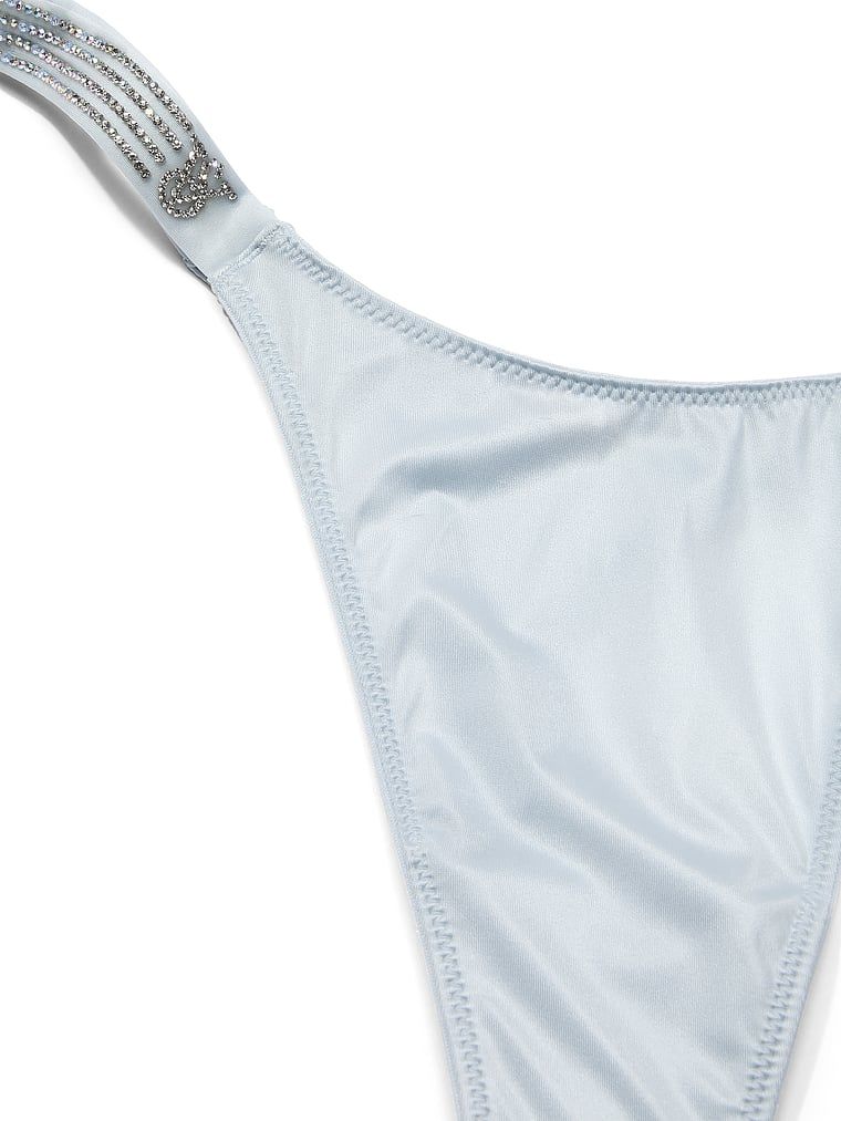 Stringi z błyszczącymi paskami Stripe Shine. Produkt ma kolor niebieski i pochodzi z kolekcji Very Sexy. 