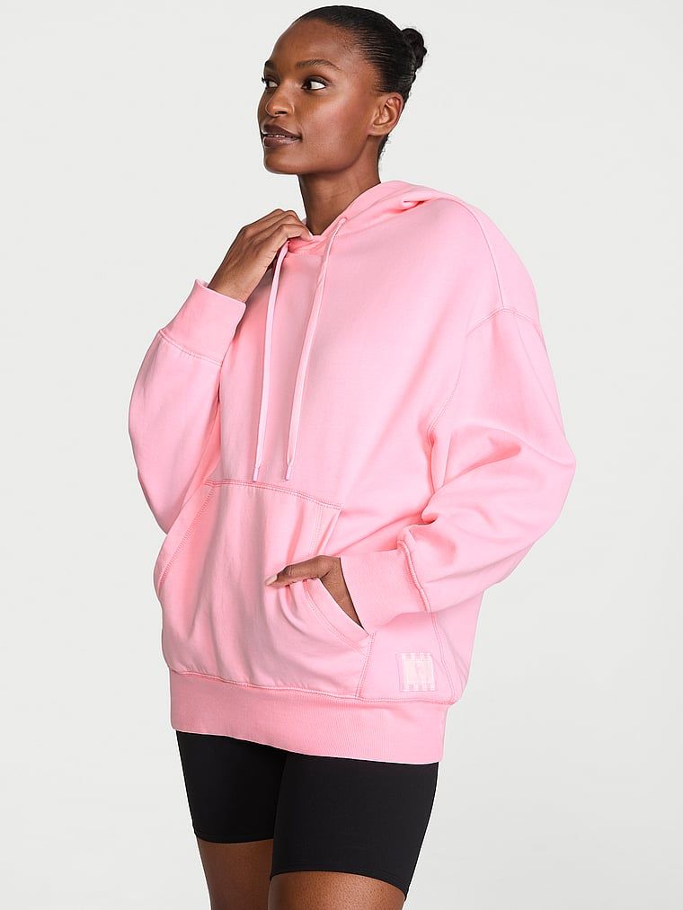 Bluza bawełniana z kapturem Iconic Fleece. Produkt ma kolor różowy i pochodzi z kolekcji Angel Essentials. 