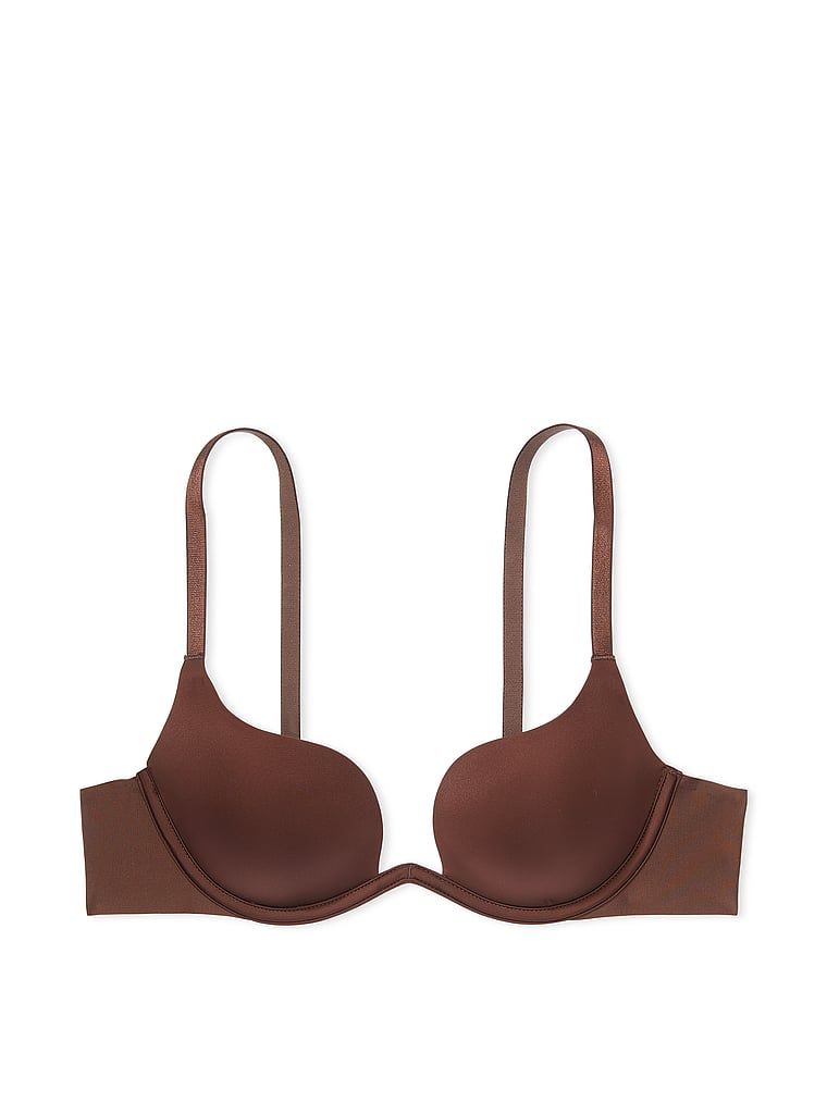Na zdjęciu na białym tle widoczny jest biustonosz lekko usztywniany z głębokim dekoltem Open Plunge. Produkt ma kolor brązowy i pochodzi z kolekcji Victoria's Secret Bare.