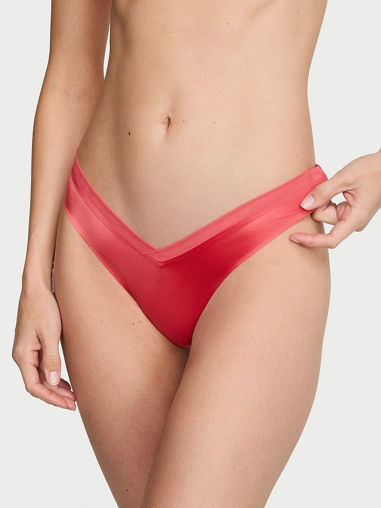 Stringi z paseczkami z tyłu Sheer Reveal. Produkt ma kolor różowy i pochodzi z kolekcji Very Sexy. 
