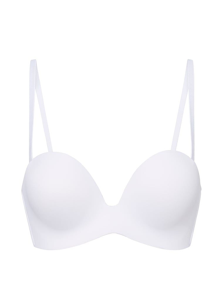 Biustonosz push-up bez ramiączek powiększający o 2 rozmiary Bombshell. Produkt ma kolor biały i pochodzi z kolekcji Invisible by Victoria's Secret. 