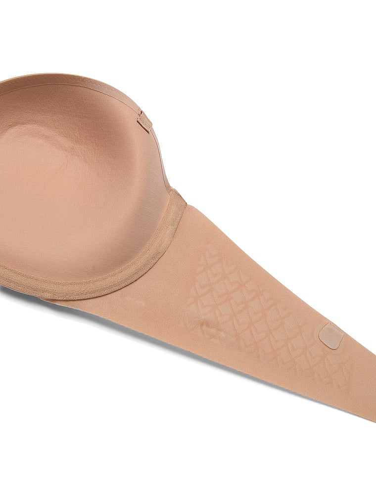 Biustonosz push-up bez ramiączek Uplift Strapless. Produkt ma kolor beżowy i pochodzi z kolekcji Invisible by Victoria?s Secret. 