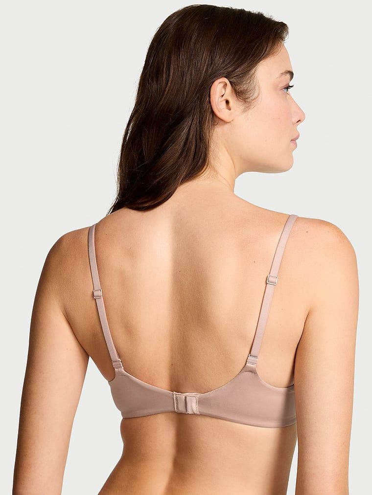 Biustonosz lekko usztywniany z mocno zabudowanymi miseczkami. Produkt ma kolor beżowy i pochodzi z kolekcji Body by Victoria. 