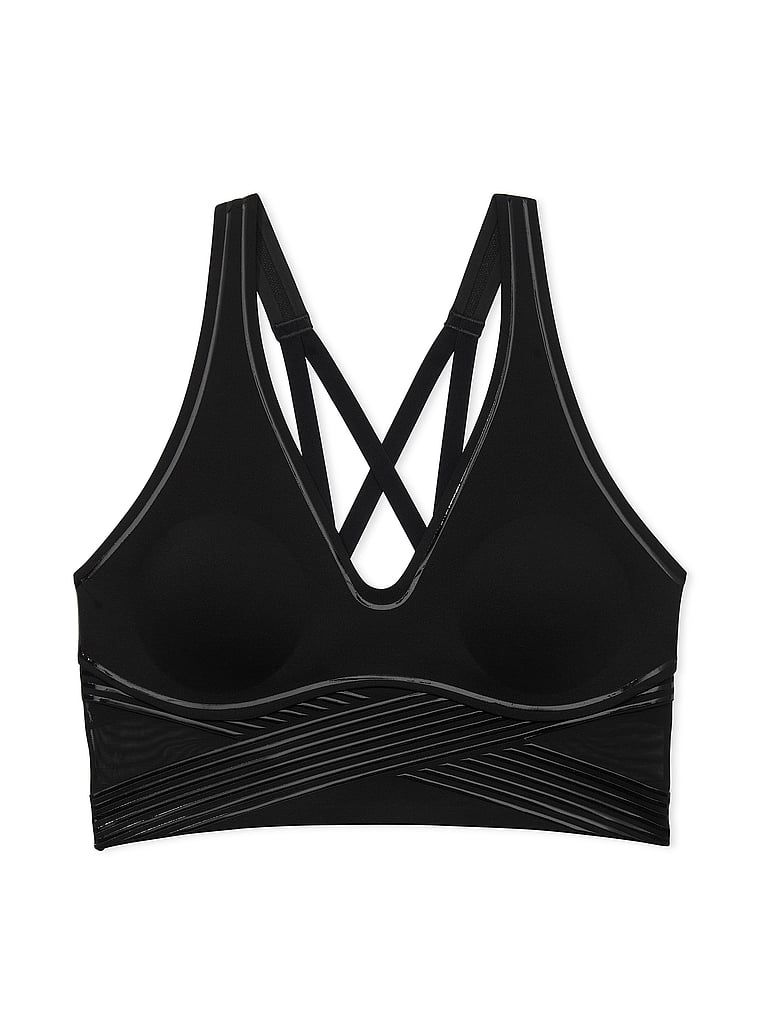 Na zdjęciu na białym tle widoczny jest biustonosz sportowy z lekkim wsparciem i dekoltem VSX Elevate Refined Contours. Produkt ma kolor czarny i pochodzi z kolekcji VSX.