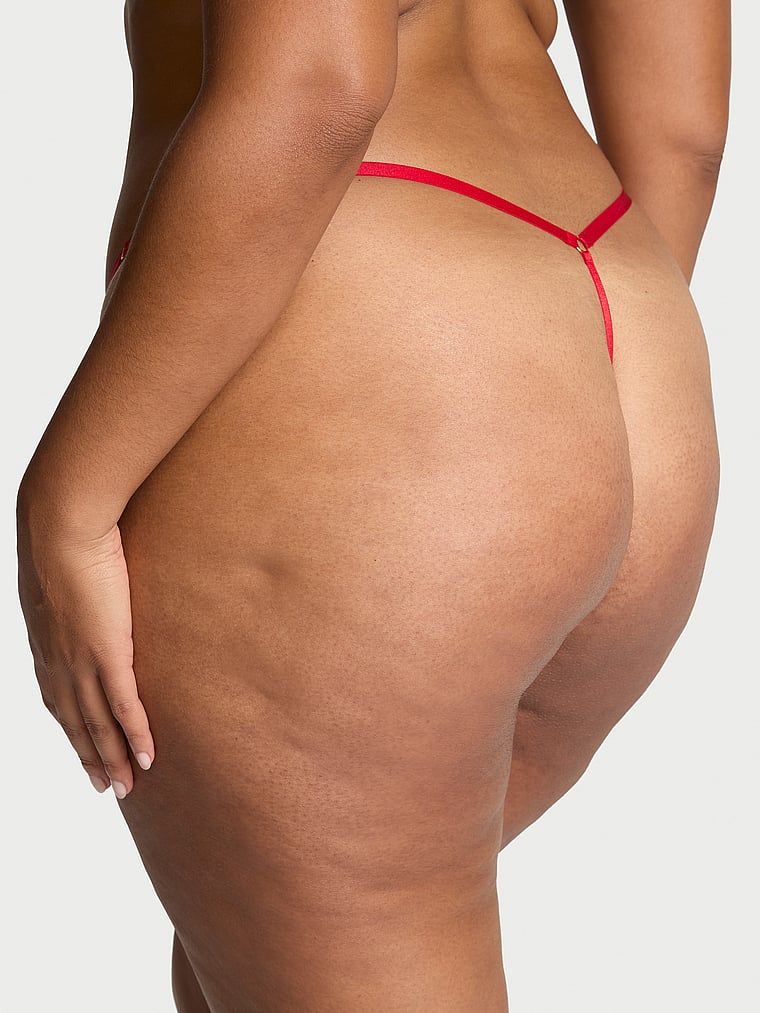 Stringi koronkowe z regulowanymi paskami Rose Lace V-String. Produkt ma kolor czerwony i pochodzi z kolekcji Very Sexy. 