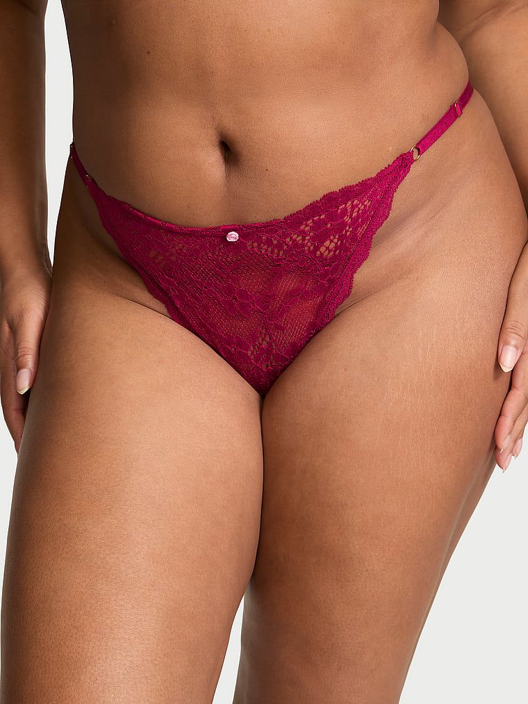 Majtki bikini koronkowe z regulowanymi paskami. Produkt ma kolor czerwony i pochodzi z kolekcji Dream Angels. 