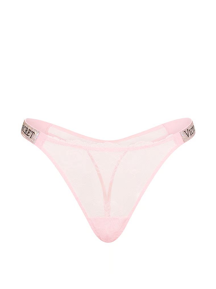 Koronkowe stringi z błyszczącymi paskami Shine Strap. Produkt ma kolor różowy i pochodzi z kolekcji Very Sexy. 