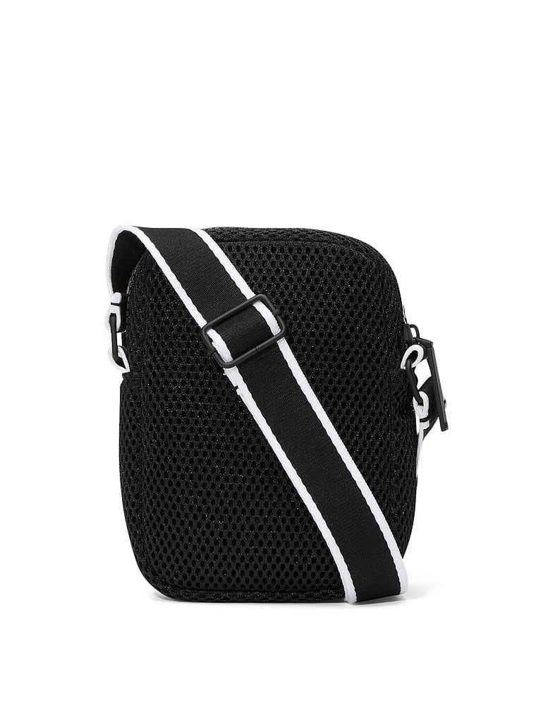 Torebka miniaturowa sportowa na ramię VSX Crossbody. Produkt ma kolor czarny i pochodzi z kolekcji Victoria's Secret. 