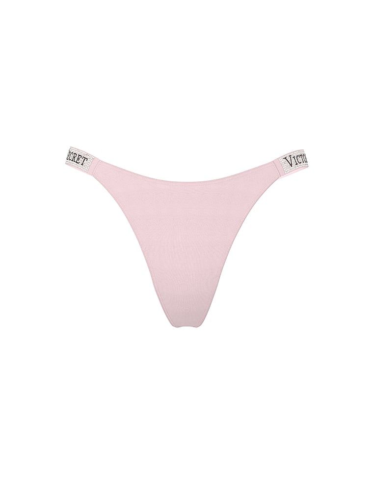 Stringi z błyszczącymi paskami Shine Strap. Produkt ma kolor różowy i pochodzi z kolekcji Very Sexy. 