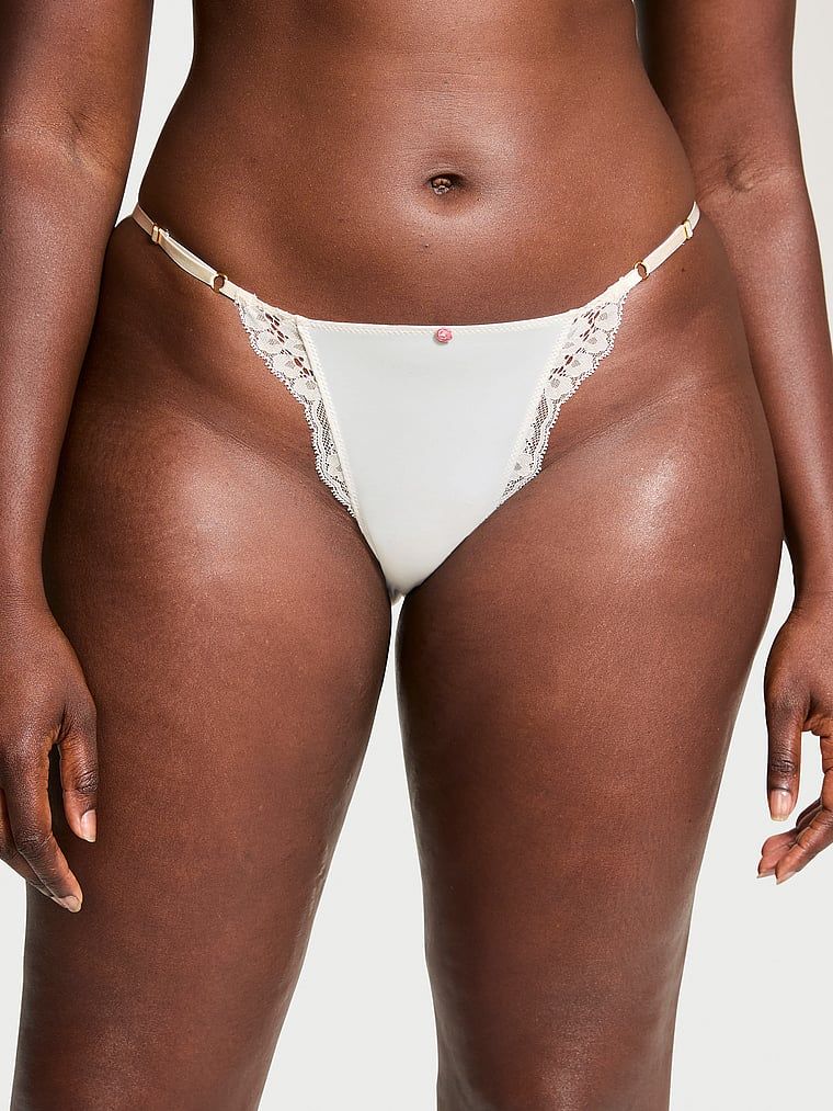 Majtki z regulowanymi paskami z koronką Lace-Trim Bikini. Produkt ma kolor biały i pochodzi z kolekcji Dream Angels. 