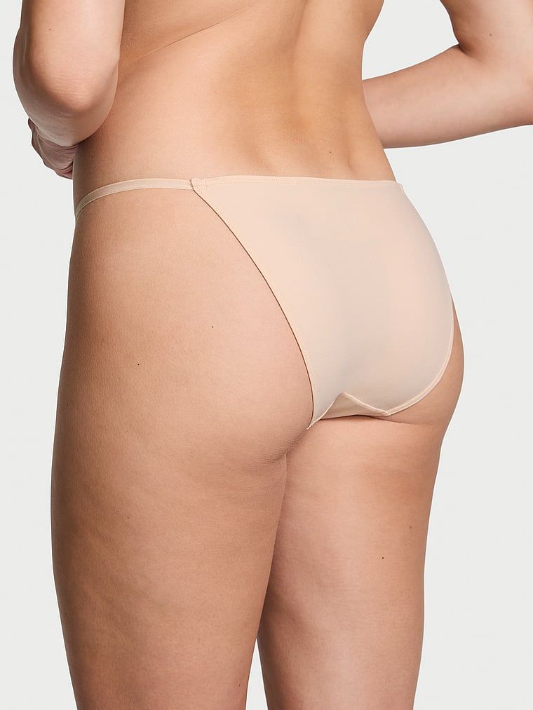 Majtki z regulowanymi paskami Bikini. Produkt ma kolor beżowy i pochodzi z kolekcji Dream Angels. 