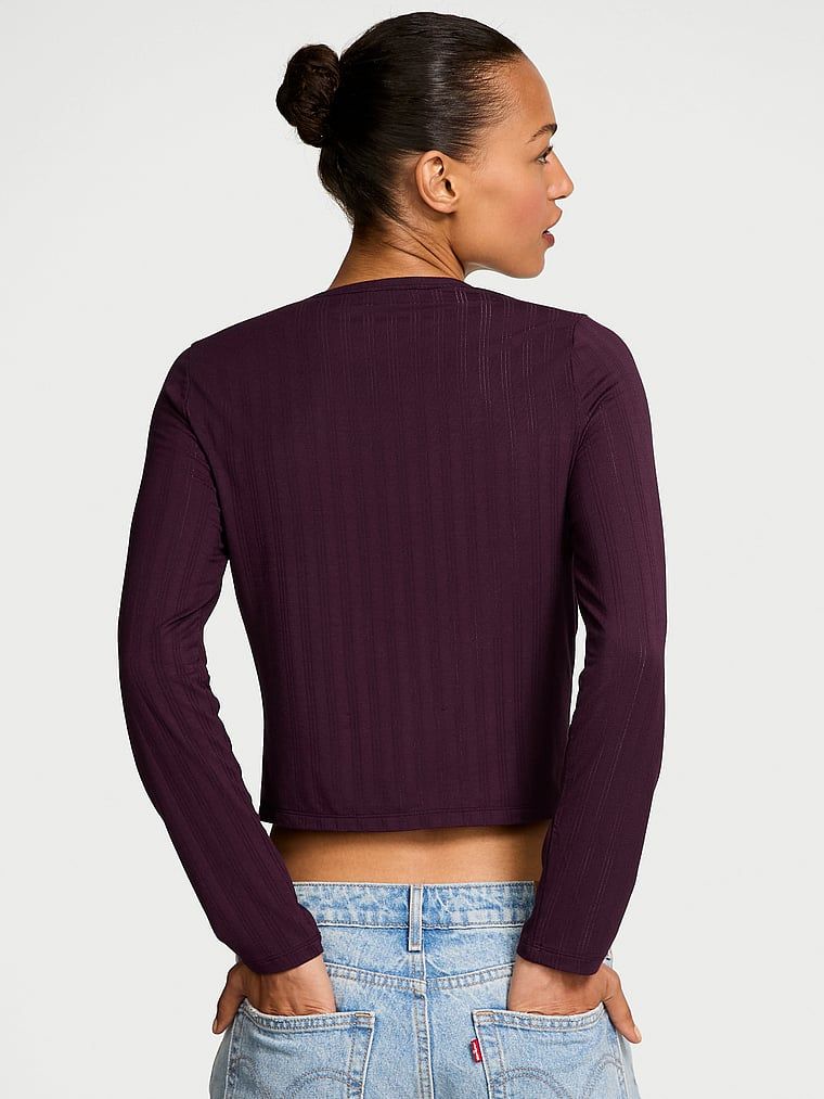 Sweter z modalu zapinany na guziki Ultra-Fine. Produkt ma kolor purpurowy i pochodzi z kolekcji Body by Victoria. 