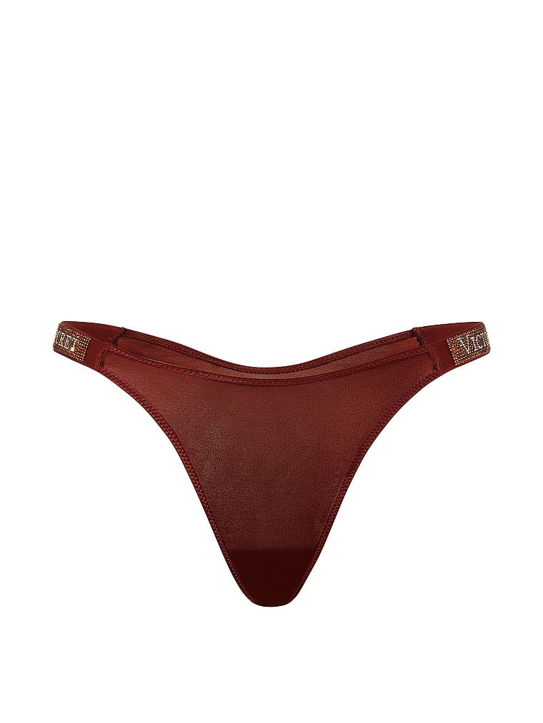 Stringi z błyszczącymi paskami Shine Strap. Produkt jest wzorzysty i pochodzi z kolekcji Very Sexy. 