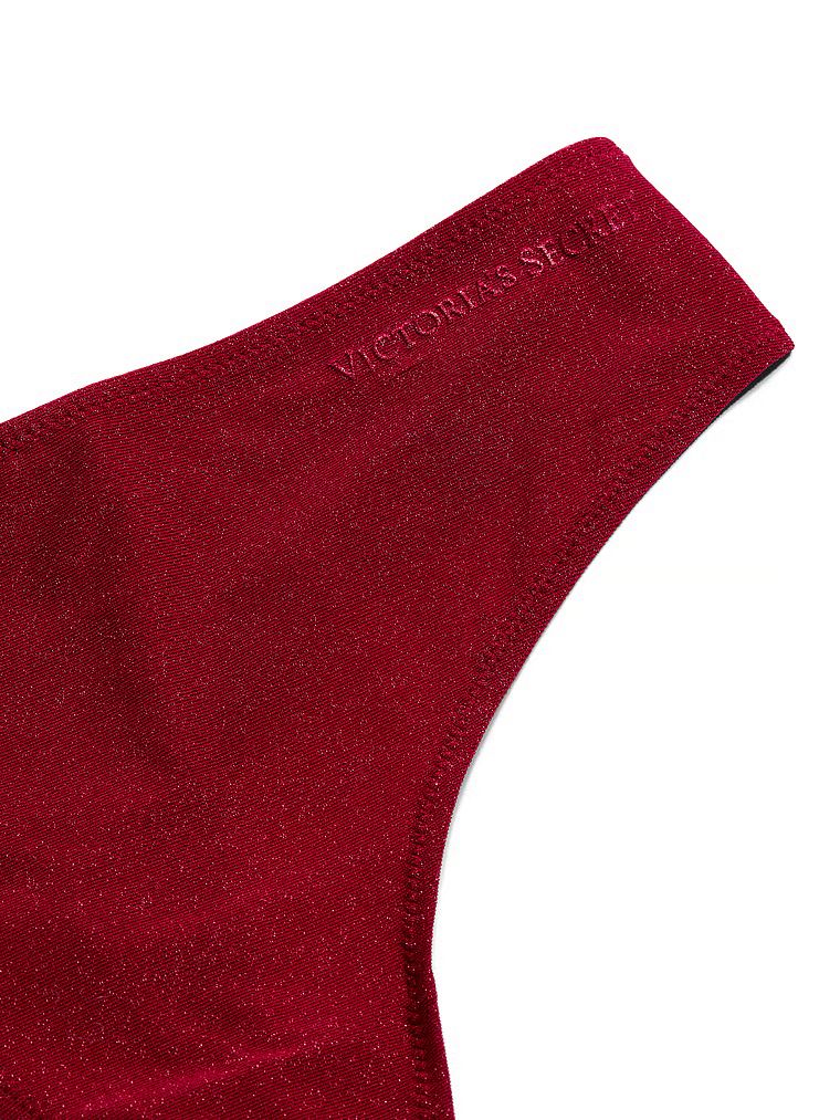 Stringi z mikrofibry Flex Shimmer. Produkt ma kolor złoty i pochodzi z kolekcji Body by Victoria. 
