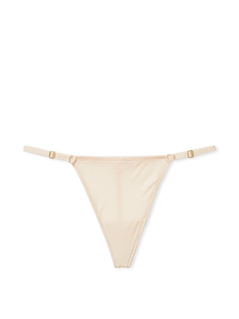 Stringi z regulowanymi paseczkami Hardware. Produkt ma kolor beżowy i pochodzi z kolekcji Very Sexy. 