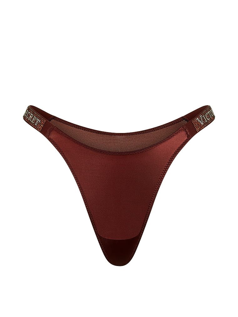 Majtki brazyliany koronkowe z błyszczącymi paskami Shine Strap Brazilian. Produkt jest wzorzysty i pochodzi z kolekcji Very Sexy. 
