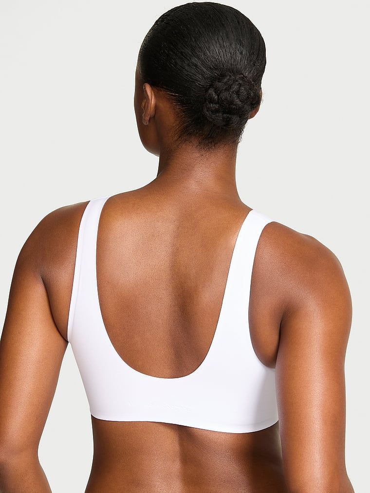 Biustonosz na co dzień i do spania SlumberBra. Produkt ma kolor biały i pochodzi z kolekcji Body by Victoria. 