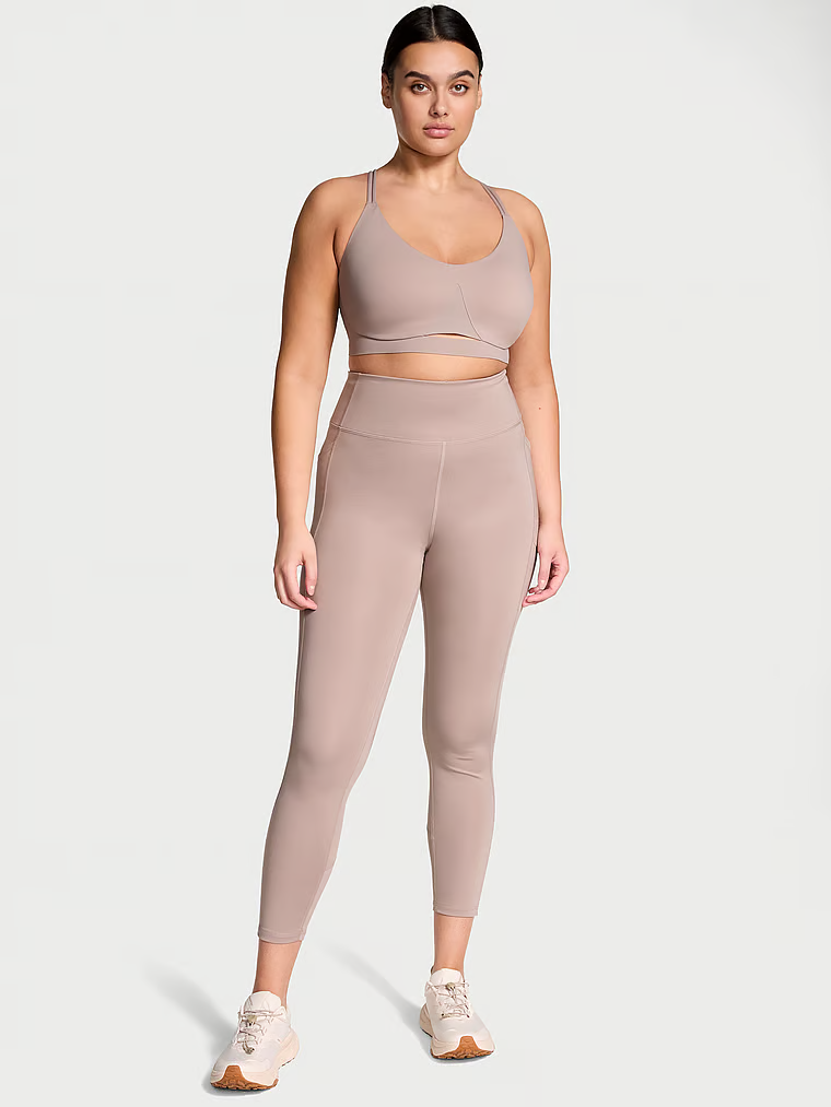 Legginsy z kieszeniami Essential Pocket. Produkt ma kolor beżowy i pochodzi z kolekcji VSX. 